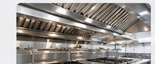Commercial kitchen with exhaust hood